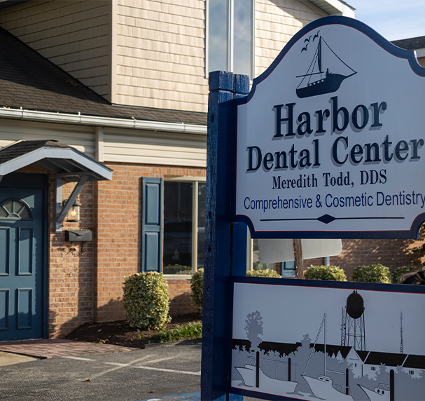 Sign for Harbor Dental Center outside of Cambridge dental office