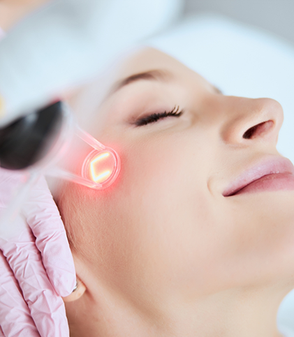 Smiling female patient during skin rejuvenation