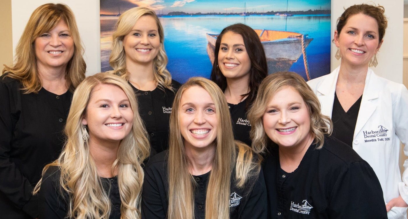 Smiling dental team members at Harbor Dental Center