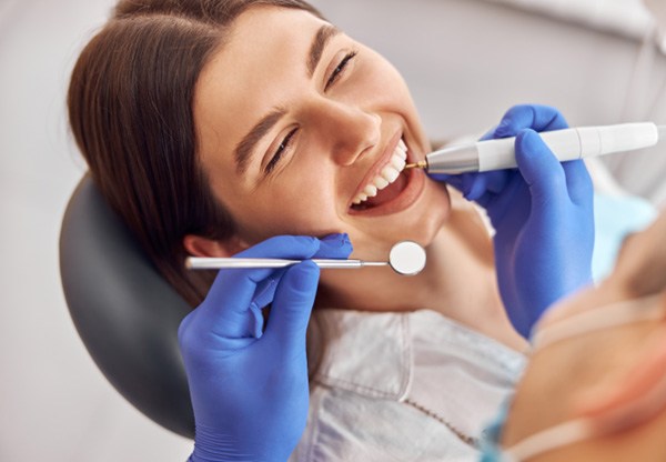 Woman smiling at the dentist