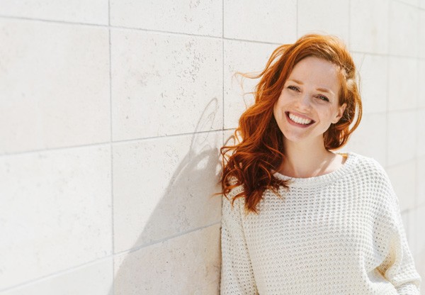 Woman smiling outside