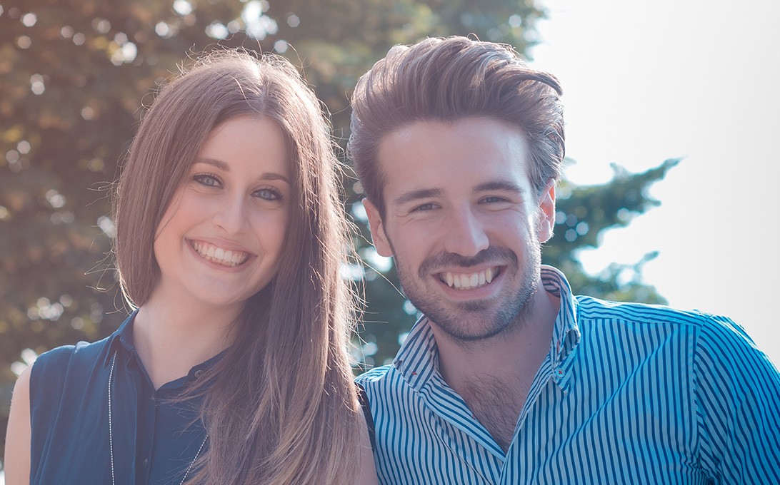 man and woman smiling together in Cambridge