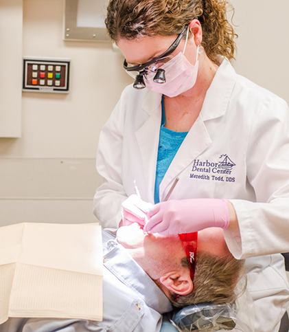 Dr. Todd treating a dental patient